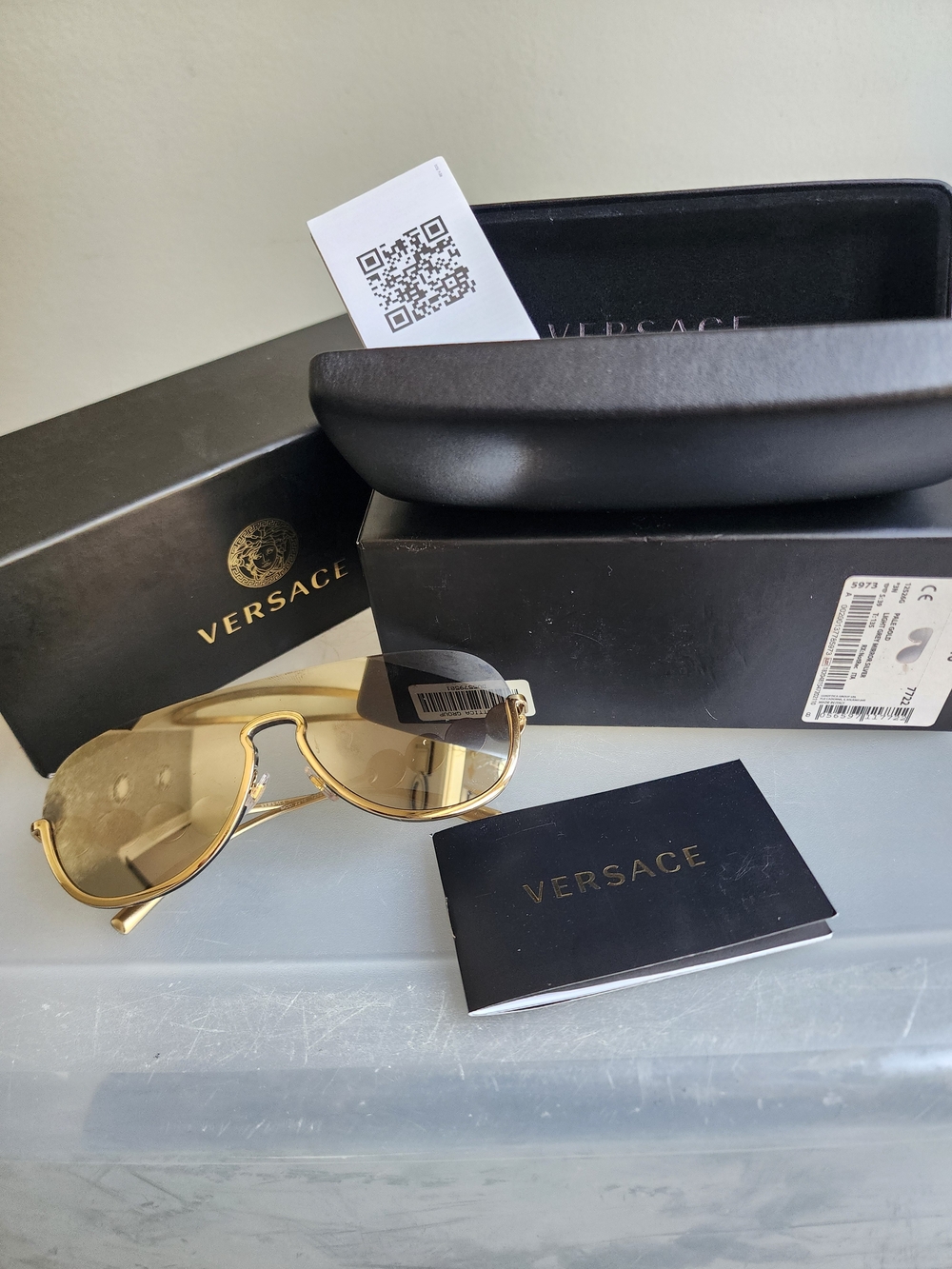 Versace Men’s Gold Rimless Aviator Sunglasses with Gold Lenses